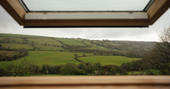 A window with a glorious view at Locke's Cottage in Wales