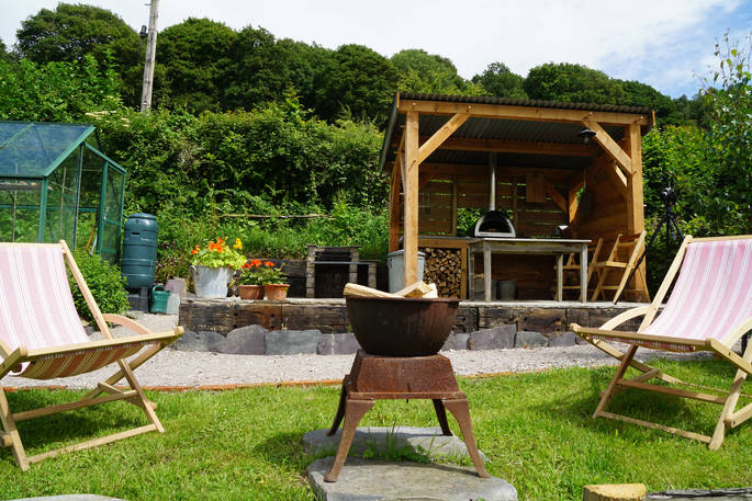 Ty Twt cabin pizza oven area at Felin Isa, Denbigh, Conwy, Wales
