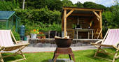 Ty Twt cabin pizza oven area at Felin Isa, Denbigh, Conwy, Wales