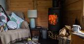 Ty Twt cabin wood fire at Felin Isa, Denbigh, Conwy, Wales