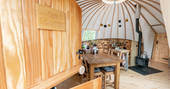 Cae Solomon at Penhein glamping alachigh tent interior with wood burner, Chepstow, Monmouthshire, Wales