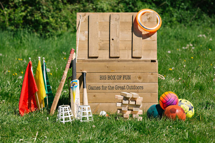 'Big box of fun' with a variety of outdoor games at Penhein Glamping in Monmouthshire