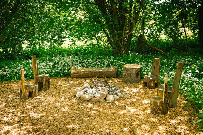 Gather with friends and family around the cosy firepit at Penhein Glamping in Monmouthshire
