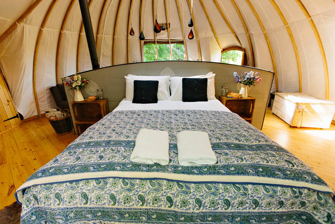 The comfortable kingsize bed inside The Cribbau in Monmouthshire