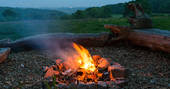 Stay cosy by the campfire and toast marshmallows at Penhein Glamping in Monmouthshire