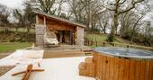 Front exterior with wood fired hot tub