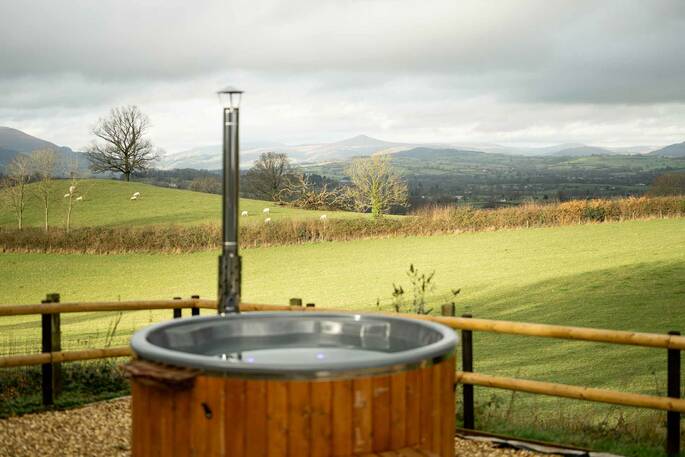 Wood-fried hot tub with a view