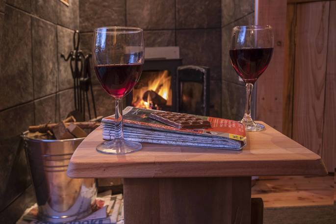 mistletoe treehouse wine by the fire