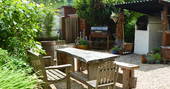 Brambling Cross cabin courtyard dining area, The Hop Garden at Kingstone Brewery, Tintern, Monmouthshire, Wales