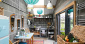 A bright and well-equipped kitchen at the Stripy Bothy, Monmouthshire in Wales