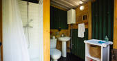 Cwtch Woodland Camp cabins loo facilities with shower, Rosemarket, Pembrokeshire