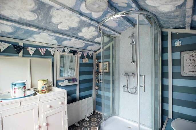 Shower block with hot shower, sink and flushing toilet