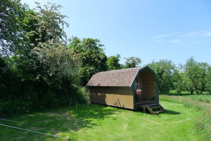 Exterior of the glamping pod at Cwt Gwyrdd in Pembrokeshire