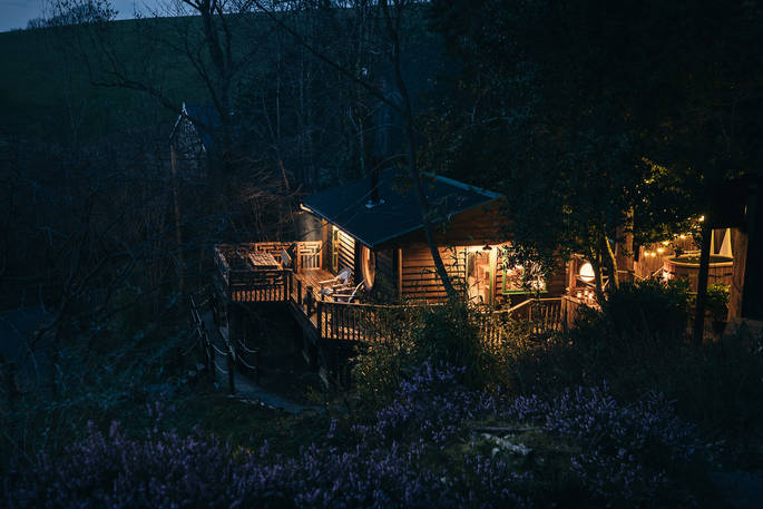 The Forager's Cabin during the night, Bed in Branches, Moel Y Garth, Welshpool, Powys, Wales - Owen Howells Photography