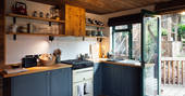 The Forager's Cabin - kitchen, Bed in Branches, Moel Y Garth, Welshpool, Powys, Wales - Owen Howells Photography