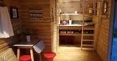 caban cadno cosy welsh cabin interior kitchen and living area powys wales
