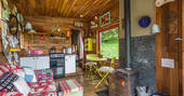 Welsh cabin featuring wood burner