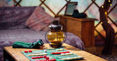 A game at the table in Jericho Yurt, Powys in Wales.