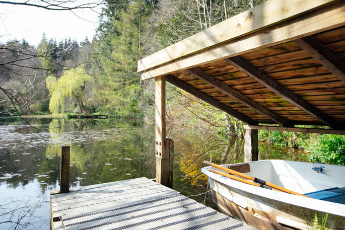The secret boat mooring and lake at Jericho Yurt, Powys in Wales.