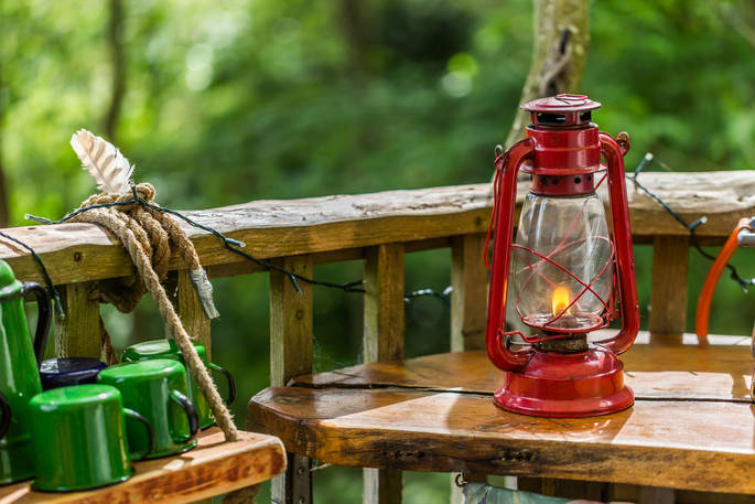 Hurricane lamp and outdoor kitchen at Old Larch Yurt in Wales