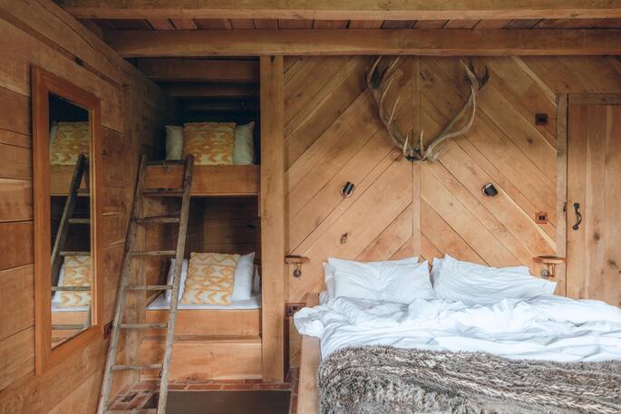Two bunk beds in bedroom