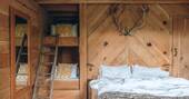 Two bunk beds in bedroom
