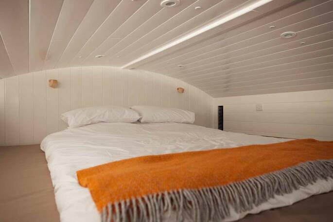 King size bed up on the mezzanine