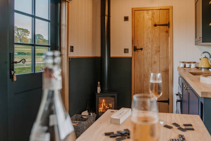 Open plan kitchen and wood burner