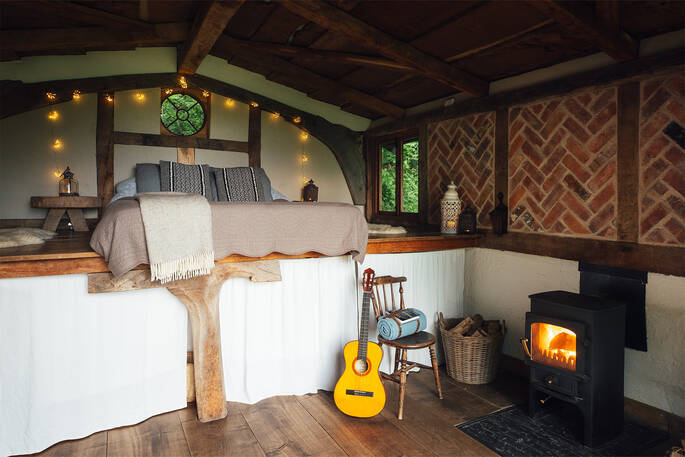 The Sleepout double doors to bedroom