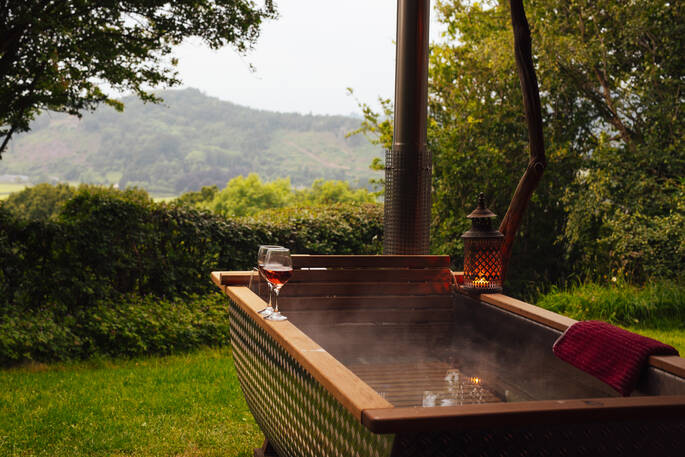 The Sleepout outdoor bath and wine