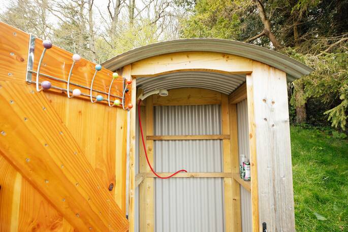 Shower block outside hut