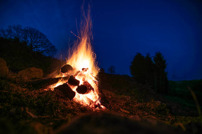 A roaring campfire at Straw Cottage in Powys, Wales