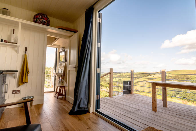 Throw open the doors and enjoy the endless hill views whilst sat in your camper van at Welsh Lavender in Powys 