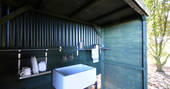 Private cabin pot wash at Hide at St Donats 