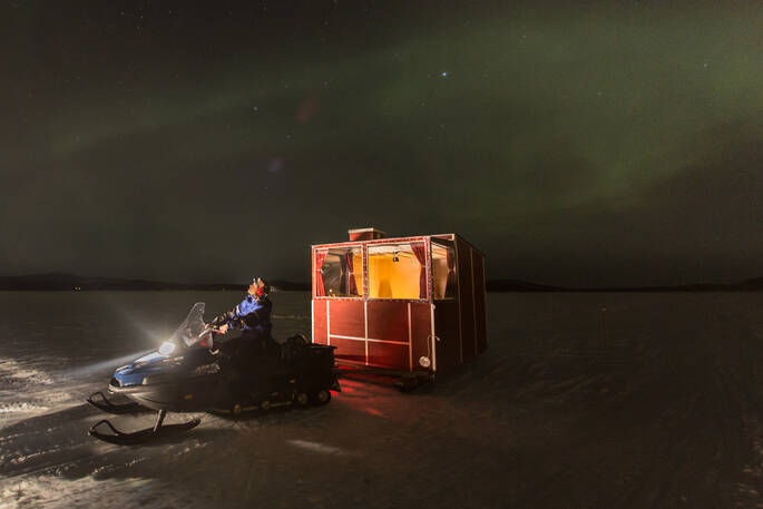 lake_inari_auroras_cabin_snowmobile
