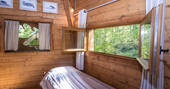 Single bed at Gauthie Lakeside Treehouse, Dordogne, France