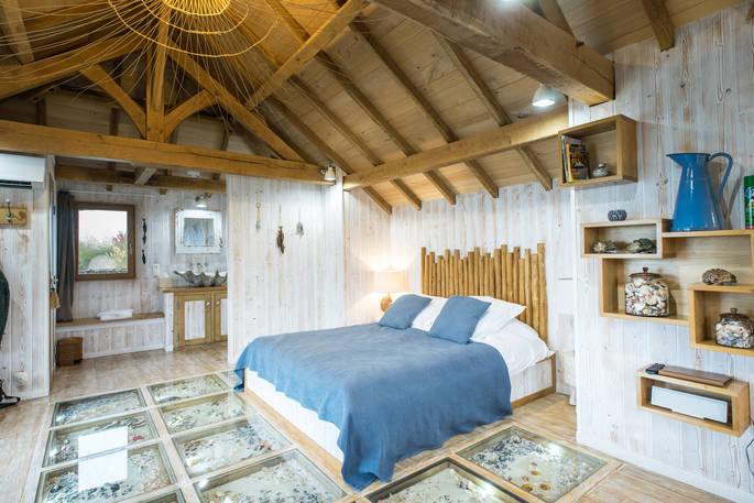 Bedroom area leading to the shower room at Chateau Biron, Châteaux dans les Arbres, Dordogne, France