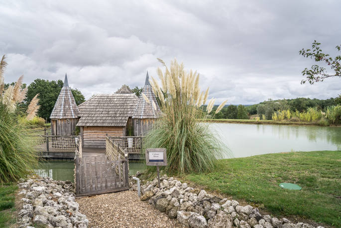 Path leading to the floating Chateau Biron at Châteaux dans les Arbres, Dordogne, France