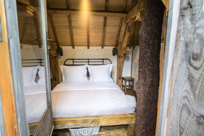 Looking into one of the double bedrooms at Hautefort Treehouse, Châteaux dans les Arbres, Dordogne, France
