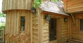 milandes dordogne france europe european glamping sunshine holidays cabin exterior treehouse rustic wooden walls