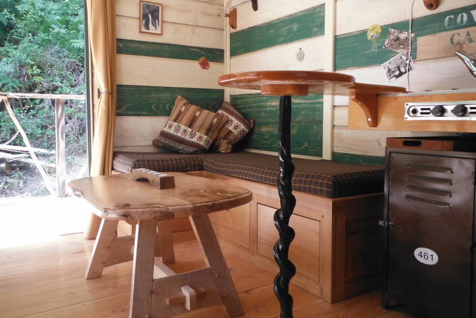 little rock cosy cabin interior dordogne france living area with seating