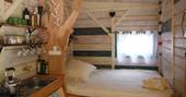 little rock cosy timber french cabin kitchen and bedroom dordogne