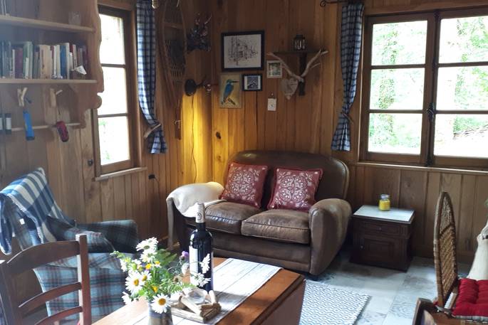 The adorable interior of Woodman's Cabin in Dordogne, France