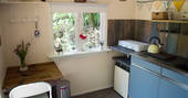 Kitchen area inside of the Roulotte at GoGreen holidays, Dordogne, France  