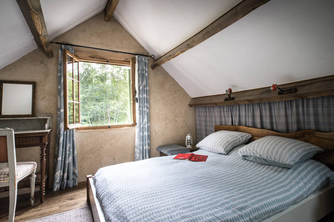 The master bedroom at Poacher's Cabin in Dordogne, France
