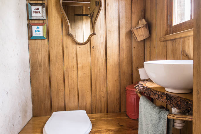 The wood cladded bathroom at Poacher's Cabin in Dordogne, France