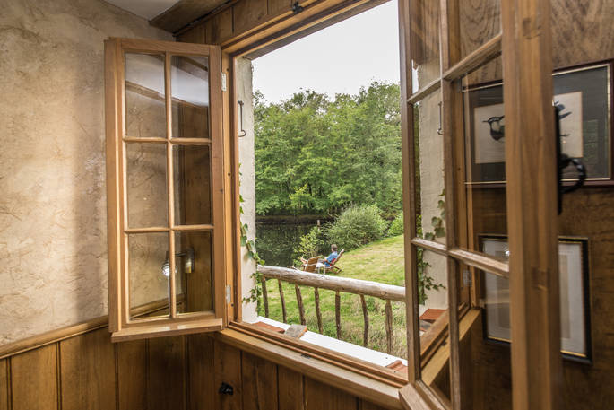 Throw open the window and let the sun pour in at Poacher's Cabin in Dordogne, France