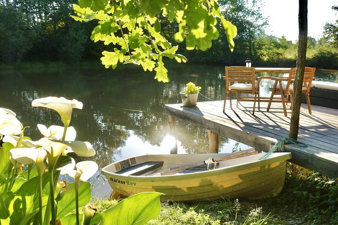 Caru Cabin decking, boat, pond and lilies, Terre et Toi, St Geraud de Corps, Dordogne, France 10