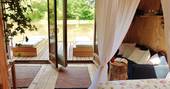 Caru Cabin view to the lake from the bed, Geraud de Corps, Dordogne, France