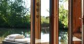 Caru Cabin view to the lake from the cabin, Terre et Toi, St Geraud de Corps, Dordogne, France 8